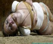 Rachel hogtied with twine from twines