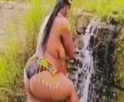 Topless South African with huge booty showers in waterfall from public south afric