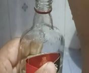 Bhabi pissing in rum bottle from bhabi close pissing
