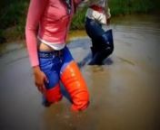 Two thai girls in muddy thigh boots!!! from mud