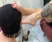 The slave is sucking, kissing and licking clean Domina’s feet, paying attention to every toe. from very beautiful maturish foot domina with hot guy