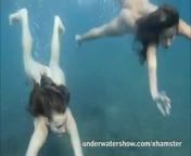 Julia and Masha are swimming nude in the sea from ls nude model masha anya