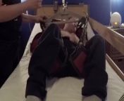 Nurse dresses cripple and uses patient lift to put him in chair from cerebral palsy and use wheelchair