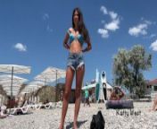 Tanned babe oils up on a public nude beach from sana vamp nude